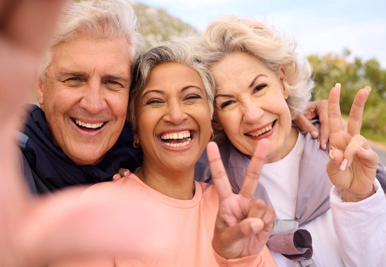 Three people posing for a picture